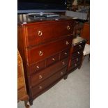 STAG MINSTREL CHEST OF DRAWERS AND MATCHING BEDSIDE CHEST OF DRAWERS