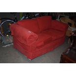 MODERN TWO SEAT SOFA WITH LOOSE RED COVERS