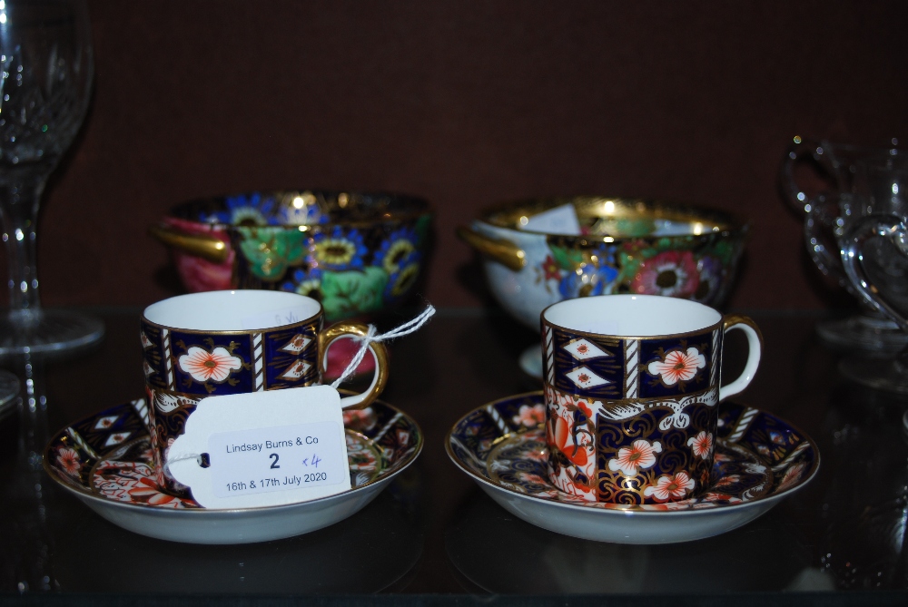 TWO ROYAL CROWN DERBY IMARI PATTERN COFFEE CANS AND SAUCERS, TOGETHER WITH TWO MALING LUSTRE