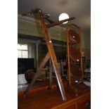 MAHOGANY THREE TIER CAKE STAND, TOGETHER WITH A STAINED MAHOGANY TRAY TROLLEY STAND