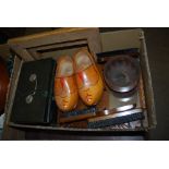 BOX - ASSORTED ITEMS INCLUDING WOODEN CLOGS, GILT PHOTO FRAMES, HANGING BRUSH SET, MONEY BOXES,