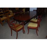 REPRODUCTION MAHOGANY DINING SUITE COMPRISING TWIN PEDESTAL DINING TABLE, SET OF SIX REGENCY STYLE