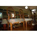 PAIR OF WALNUT FRAMED EDWARDIAN ARMCHAIRS WITH CARVED BACKS AND EMBROIDERED STUFFOVER SEATS, ON