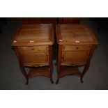 PAIR OF FRENCH WALNUT POT CUPBOARDS, EACH WITH SINGLE PANELLED DOOR AND SINGLE FRIEZE DRAWER, ON