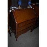 A 20TH CENTURY WALNUT FALL FRONT WRITING BUREAU ON CABRIOLE LEGS