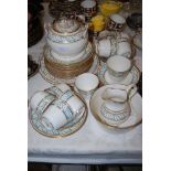 ENGLISH PORCELAIN WHITE, TURQUOISE AND GILT PATTERNED TEA SERVICE