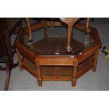 WALNUT AND CANEWORK OCTAGONAL SHAPED COFFEE TABLE WITH GLAZED TOP