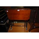 AN EDWARDIAN MAHOGANY INLAID SUTHERLAND TABLE TOGETHER WITH A 19TH CENTURY MAHOGANY POLE SCREEN (