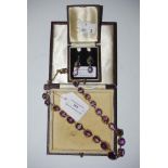 SUITE OF WHITE METAL AND AMETHYST JEWELLERY COMPRISING NECKLACE AND PAIR OF EARRINGS