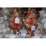 PAIR OF BROWN GROUND CHINESE JARS AND COVERS DECORATED WITH MIXED FOLIAGE