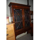 LATE 19TH/EARLY 20TH CENTURY MAHOGANY TWO DOOR DISPLAY CABINET WITH GLAZED ASTRAGAL DOORS AND DENTIL