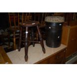 STAINED BEECH CIRCULAR STOOL WITH CROSS STRETCHER TOGETHER WITH A METAL BOUND BARREL SEAT