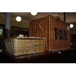 WICKER LAUNDRY BASKET AND A SMALL WICKER BASKET