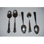 FIVE DANISH SILVER TABLE SPOONS WITH BEADED DETAIL AND HAMMERED FINISH