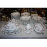 LIMOGES WHITE, FLORAL AND GILT PATTERNED DINNER SERVICE