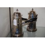 PAIR OF SHEFFIELD SILVER CHOCOLATE POTS WITH TURNED EBONISED HANDLES