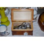 STAINED CARVED TRINKET BOX CONTAINING COLLECTION OF PEWTER NAPKIN RINGS, BERRY SPOON AND SOUVENIR