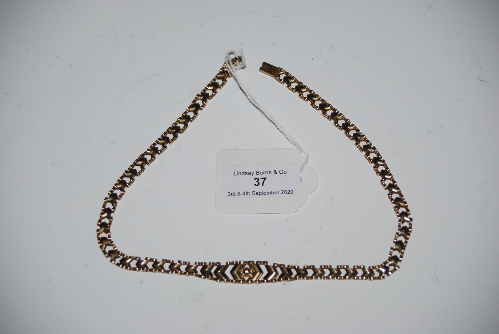 A 9CT GOLD NECKLACE, 16.9 GRAMS