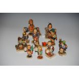 COLLECTION OF ELEVEN ASSORTED HUMMEL FIGURES