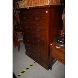 19TH CENTURY MAHOGANY TEN DRAWER CHEST OF DRAWERS SUPPORTED ON PLATFORM BASE
