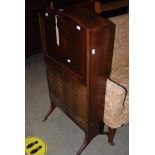 LATE 19TH / EARLY 20TH CENTURY MAHOGANY DOME TOP FALL FRONT DESK WITH TWO PANELLED DOORS SUPPORTED