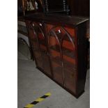 STAINED PINE HANGING WALL CABINET WITH GLAZED ASTRAGAL DOORS