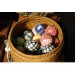 WICKER BASKET CONTAINING QUANTITY OF SCOTTISH CARPET BOWLS