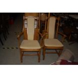 PAIR OF STAINED BEECH ERCOL ARMCHAIRS WITH STUFFOVER SEATS AND BACKS