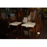 PAIR OF EDWARDIAN MAHOGANY INLAID BEDROOM CHAIRS WITH SERPENTINE STUFFOVER SEATS SUPPORTED ON SQUARE