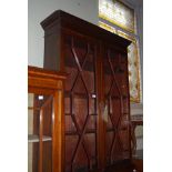 EARLY 20TH CENTURY MAHOGANY BUREAU BOOKCASE, THE UPPER SECTION WITH GLAZED ASTRAGAL DOORS, ON