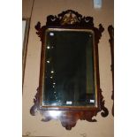 GEORGE III STYLE FACET CUT MAHOGANY WALL MIRROR WITH GILT DECORATION