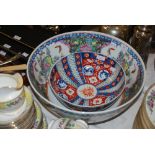 REPRODUCTION LARGE FAMILLE ROSE PATTERNED BOWL, TOGETHER WITH A REPRODUCTION IMARI PATTERNED BOWL