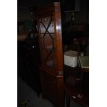 REPRODUCTION MAHOGANY CORNER CABINET TOGETHER WITH A MAHOGANY CIRCULAR OCCASIONAL TABLE