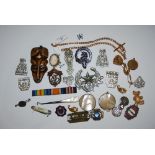 COLLECTION OF ASSORTED COSTUME JEWELLERY, MILITARY BADGES, MOTHER OF PEARL HANDLED BOOT HOOK, ST