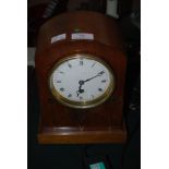 WALNUT CASED INLAID MANTEL CLOCK WITH ENAMEL DIAL AND ROMAN NUMERALS