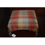 SQUARE SHAPED UPHOLSTERED FOOTSTOOL WITH GILT MOUNTS WITH HOOF DECORATION