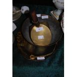 PAPIER MACHE DISH WITH CARRYING HANDLE, TOGETHER WITH AN EASTERN BRASS BOWL AND A BRASS UTENSIL