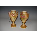 ****WITHDRAWN LOT**** PAIR OF ROYAL WORCESTER IVORY GROUND TWIN HANDLED PORCELAIN VASES DECORATED