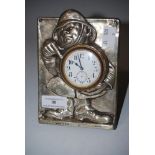 NOVELTY BIRMINGHAM SILVER MOUNTED WATCH STAND, MODELLED WITH EMBOSSED SILVER FIREMEN POINTING AT A