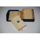 IVORY AND WHITE METAL BOUND BOOK OF COMMON PRAYER IN ORIGINAL BLUE/GREEN LEATHER COVERED CASE