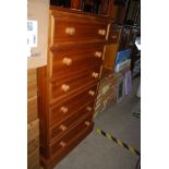 SMALL COLLECTION OF MODERN PINE FURNITURE INCLUDING A TWO OVER THREE CHEST OF DRAWERS, A SIX