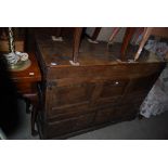 A 19TH CENTURY STAINED OAK COFFER WITH THREE FRIEZE DRAWERS