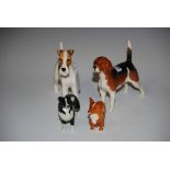 FOUR ASSORTED BESWICK DOG FIGURES - CH. TALAVERA ROMULES, ANOTHER CH. WENDOVER BILLY, BLACK AND