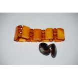 EARLY 20TH CENTURY BAKELITE EXPANDING BRACELET, TOGETHER WITH A PAIR OF WHITE METAL AND FAUX