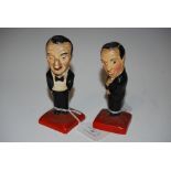PAIR OF EARLY 20TH CENTURY COLD PAINTED POTTERY FIGURES DEPICTING THE ACTORS TOM WALLS AND RALPH