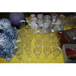 PART SUITE OF ETCHED GLASSWARE INCLUDING DECANTERS, PLAIN FLUTES, STEMMED WINE GLASSES, STEMMED