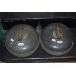PAIR OF VINTAGE GRANITE CURLING STONES WITH BRASS AND WOODEN HANDLES, NO. 1 & 2