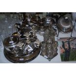 ASSORTED EP WARE INCLUDING THREE PIECE FLUTED TEA SERVICE, CONDIMENT SETS ON PLATED STANDS,