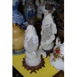 PAIR OF CHINESE CERAMIC CARP FIGURAL TABLE LAMPS ON HARDWOOD STANDS