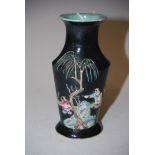 CHINESE PORCELAIN BLACK GROUND MINIATURE VASE, QING DYNASTY, DECORATED IN RELIEF WITH FIGURES